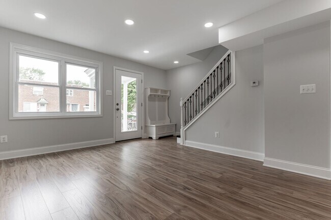 Building Photo - Enjoy the Park View from this Tastefully U...