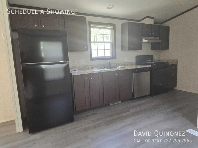 Building Photo - Sale Prices Starting at: $54,999 or Lease ...