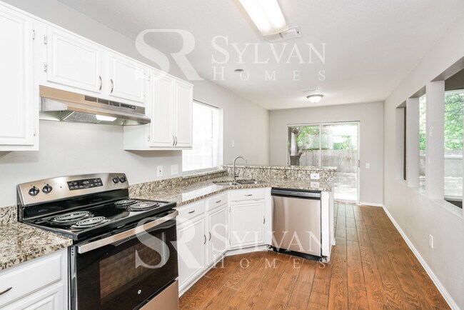 Building Photo - Turn the key. Enter. Smile. Repeat every day!