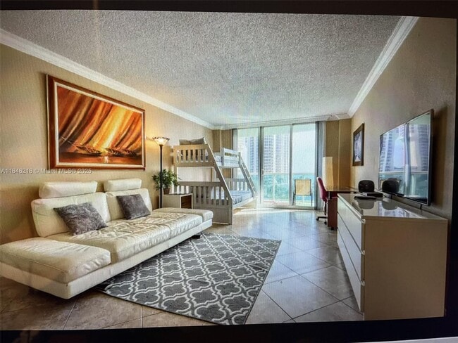 Building Photo - 19370 Collins Ave