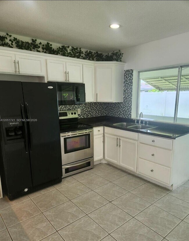Building Photo - 2710 NW 52nd Pl