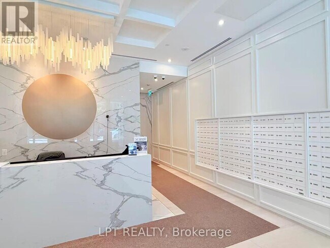 Photo du bâtiment - 100 Queen St E