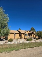 Building Photo - 129 Woodsman Dr