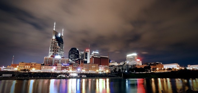 The lights of Nashville reflect on the water