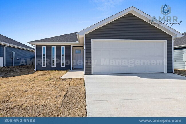 Foto del edificio - 3-Bedroom Home In Suburban-Style Neighborh...