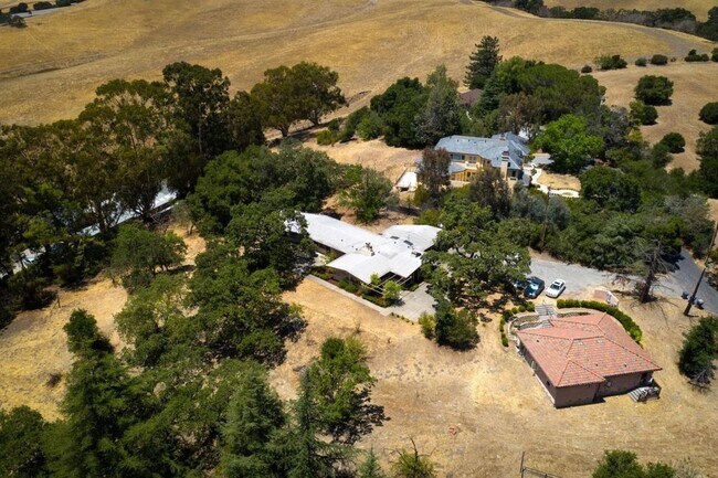 Cottage has the Mediterranean tile roof - 2265 Old Page Mill Rd