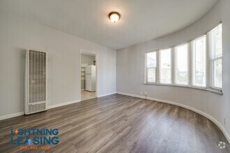Building Photo - 6415 S Van Ness Ave