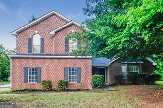 Building Photo - 6144 Idlewood Manor