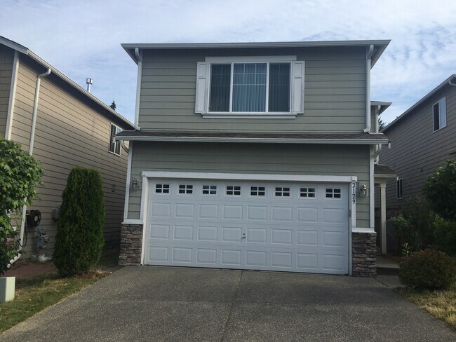 Building Photo - Spacious and Updated Home with Attached Ga...