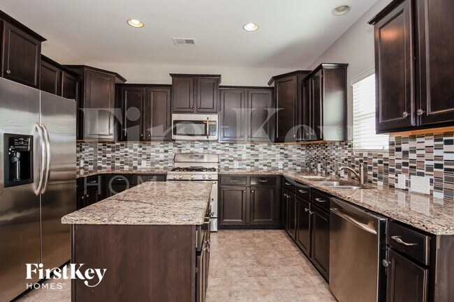 Building Photo - 6729 Barefoot Forest Dr