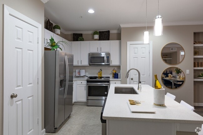 Building Photo - Spacious Floor Plans & Premium Amenities A...
