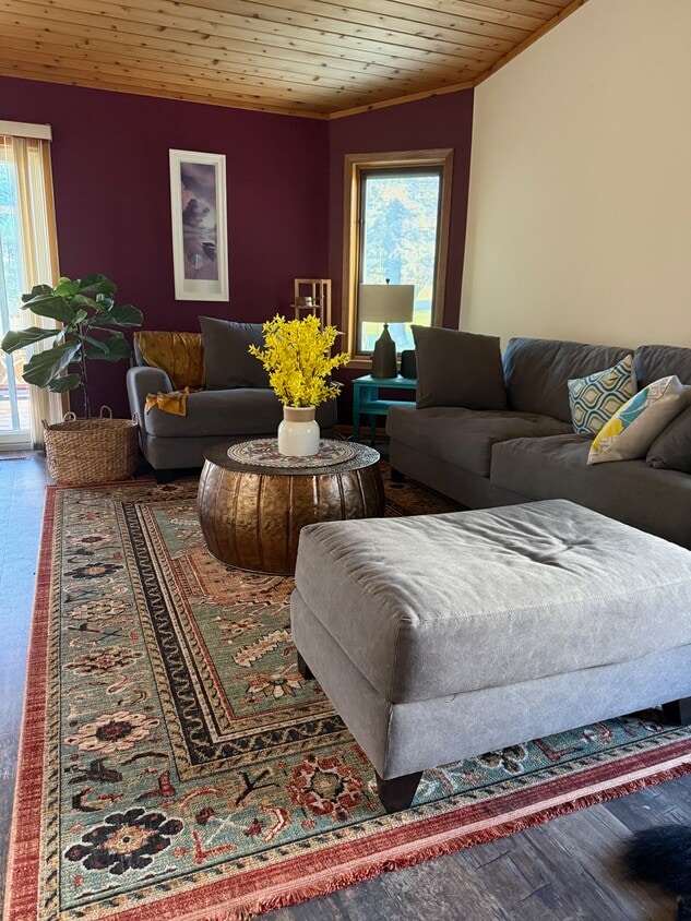 The living-dining area that connects to a beautiful screened porch - 4888 Tee Ct SW
