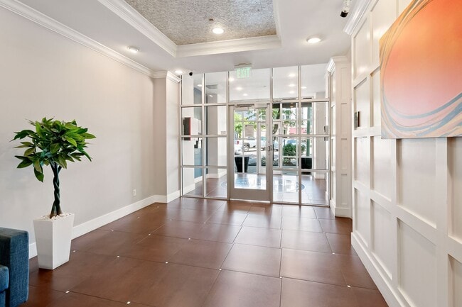 Building Photo - 2BR Condo w/ Covered Parking and Balcony Views at Broadway Towers