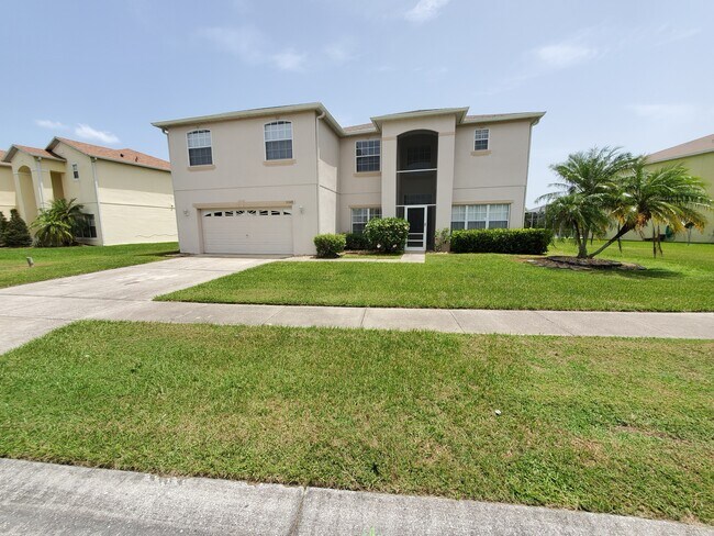 Low maintenance stucco, large lot, screened porch entrance, double car garage - 5368 Dahlia Reserve Dr