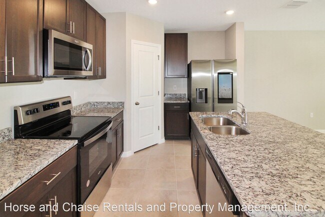 Building Photo - 3 br, 2.5 bath House - 17047 Coral Key Dr