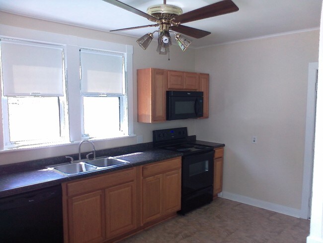 View Into Kitchen From Dining Room - 718 S Brady St