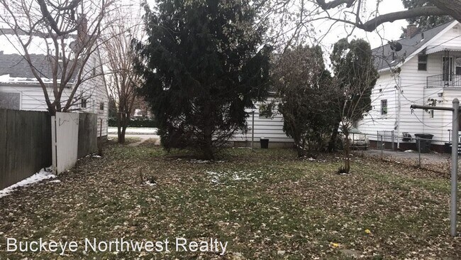 Building Photo - 2 br, 1 bath House - 405 E Manhattan