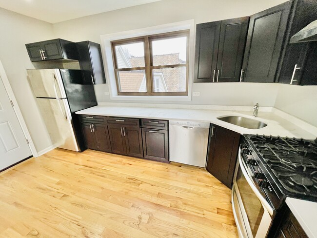 Luxury living at affordable prices! - 3506 N Hamlin Ave