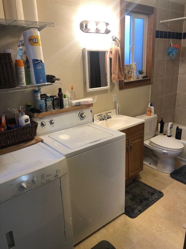 bathroom with washer and dryer - 1077 12th Street