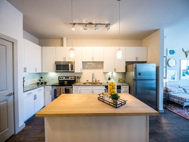 Building Photo - Elevate Your Austin Life | Enjoy Up to 6 W...