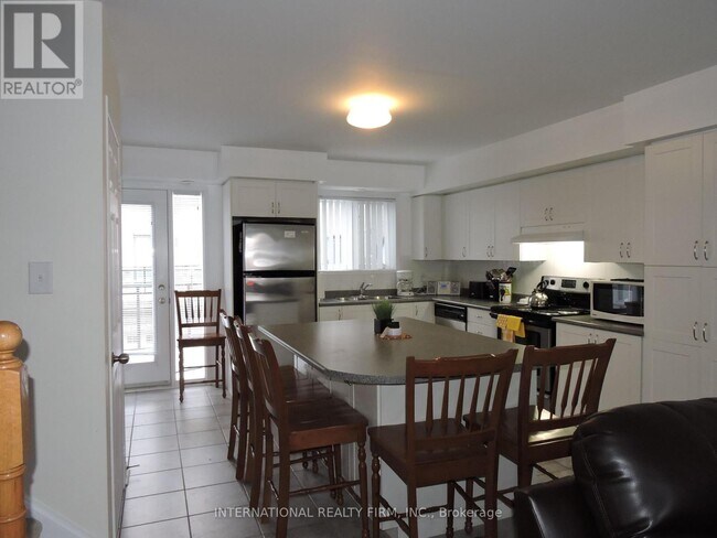 Building Photo - 5035 Oscar Peterson Blvd