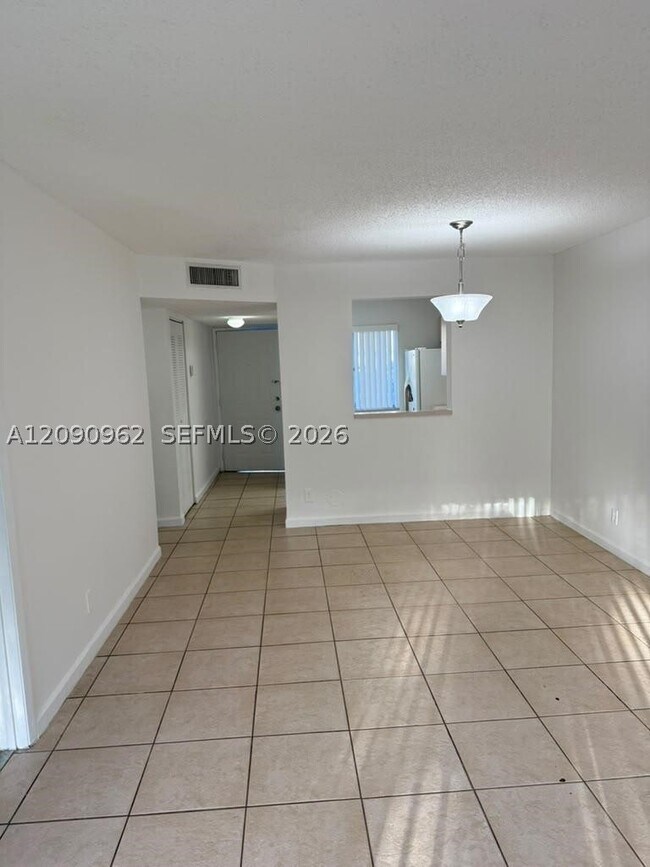 Building Photo - 8740 N Sherman Cir