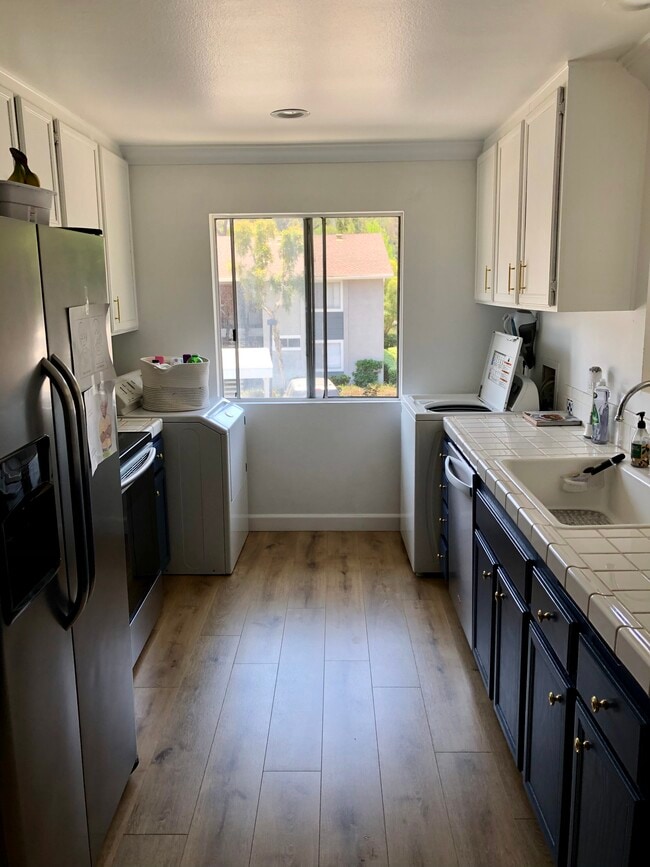 Kitchen has two windows and is always light and bright. - 23705 Sea Breeze Ln