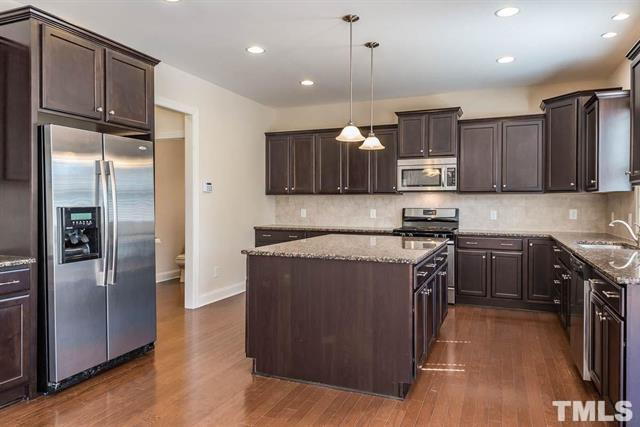 Building Photo - Beautiful 4-Bedroom Stone Front Home in Prime West Cary Location with Fenced Backyard & Resort-St...
