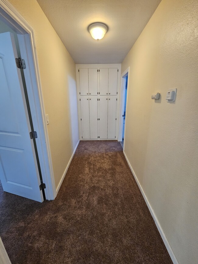 Hallway with Storage - 4428 N Lakewood Blvd