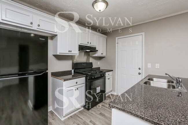 Foto del edificio - Enjoy living the good life in this 4 bedroom, 2 bathroom home