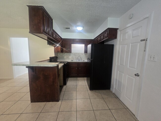 Foto del edificio - 7518 Hummingbird Ln