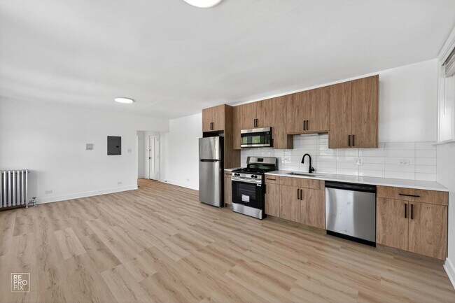 Foto del edificio - 6312 N Artesian Ave
