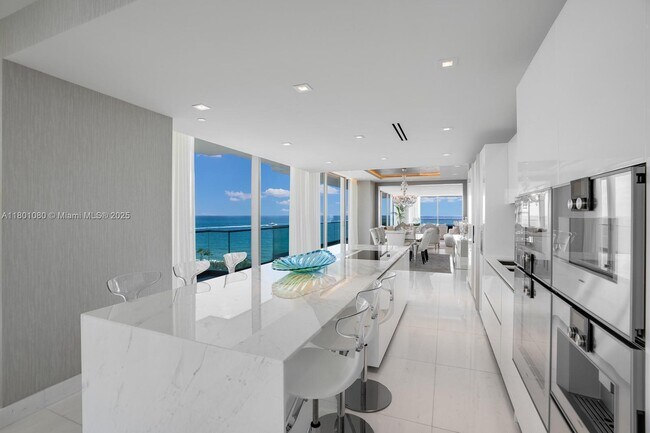 Building Photo - 10203 Collins Ave