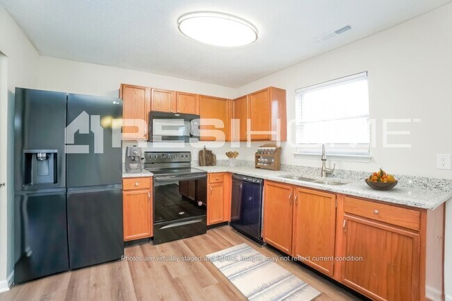 Foto del edificio - 13344 N Brick Chapel Dr