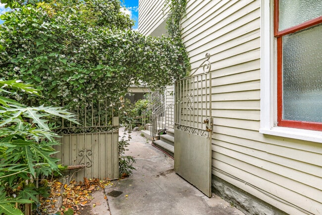 Gate to rear yard - 1818 Esplanade Ave