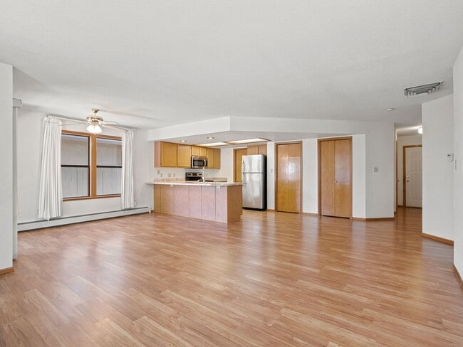 Photo - Spacious 2BR Rental with Open Floor Plan & Low-Maintenance yard House