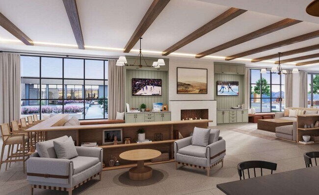 Elegante salón para residentes con techo con vigas de madera, televisores, chimenea y grandes ventanales con vista a un patio al aire libre. - Oakwood Trails