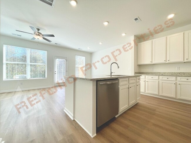 Building Photo - Move In by April 30 & Save $200/Month! Townhome Only $1,695! Regular $1,950 — Available NOW