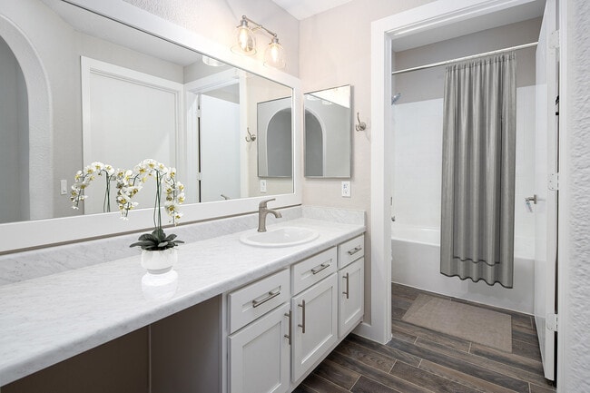 Experience luxury in this elegantly designed bathroom with modern finishes. - Timberline Place