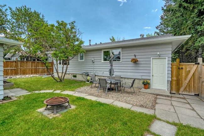 Backyard with separate and private entrance - 164 Midpark Cres SE