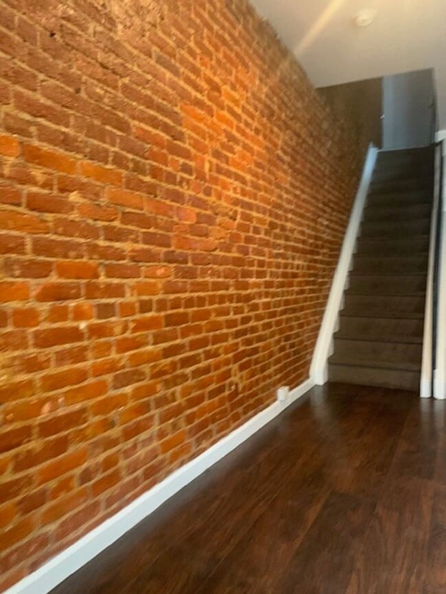 Photo - Charming 3bd/2bth now available for rent w/ expose brick. House