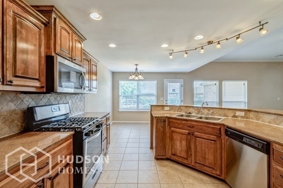 Building Photo - NOW AVAILABLE! 1950 W WOODBURY, BROKEN ARR...
