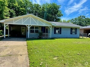 Building Photo - 7813 Woodfield Dr