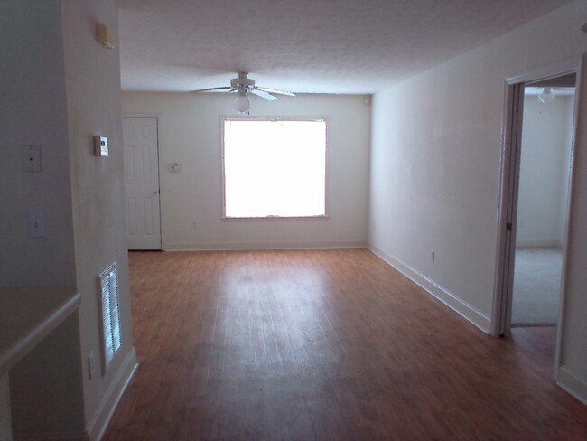 Living room from Kitchen - Christopher Downs Apartments