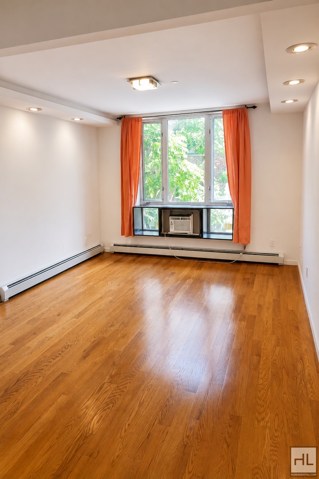 Building Photo - Second-Floor Apartment on Britton Ave – Elmhurst, NY