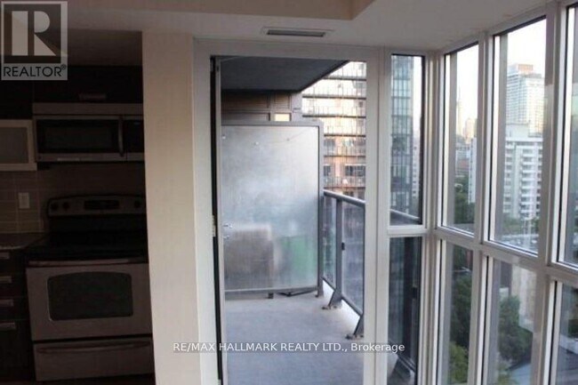 Building Photo - 28-1128 Ted Rogers Way