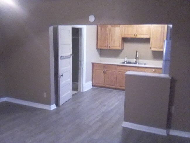 living room view into kitchen - 1124 Almaden St Apartment