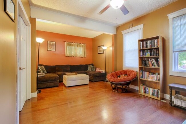 Huge living room with hardwood floors. . . - 5302 Broadway