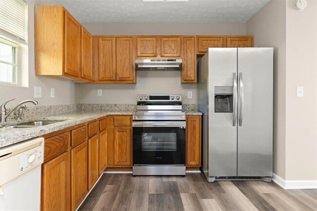 Building Photo - 5696 Windfall Ln