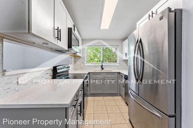 Building Photo - 2 br, 1 bath House - 7110 E 63rd Ave